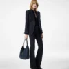 Pantaloni evazați din denim croiți pe măsură