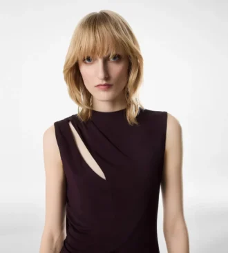 Rochie de cocktail cu decupaje și detalii tip eșarfă