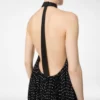 Rochie de seară din mătase halterneck cu plisuri în formă de raze de soare și detalii din piele Rochie de seară din mătase halterneck cu plisuri în formă de raze de soare și detalii din piele