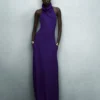 Rochie lungă cu gât halter, buzunare și spate decupat Rochie lungă cu gât halter, buzunare și spate decupat